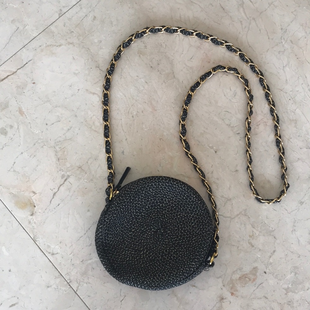 Sun ‘n’ sand canteen black and gold purse.